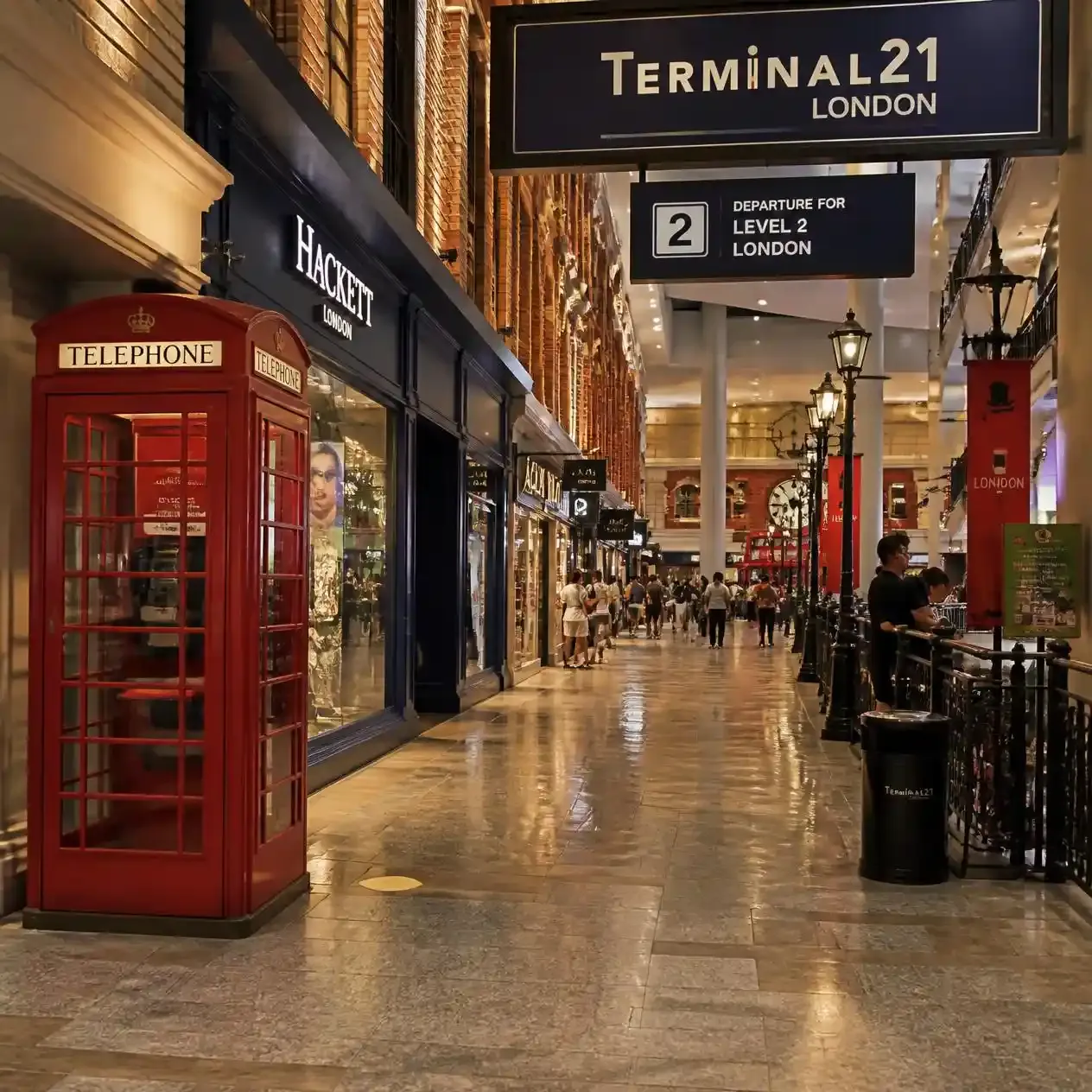 Red telephone boxes and menswear shopfronts on the London-themed second floor of Terminal 21 Asok in Bangkok