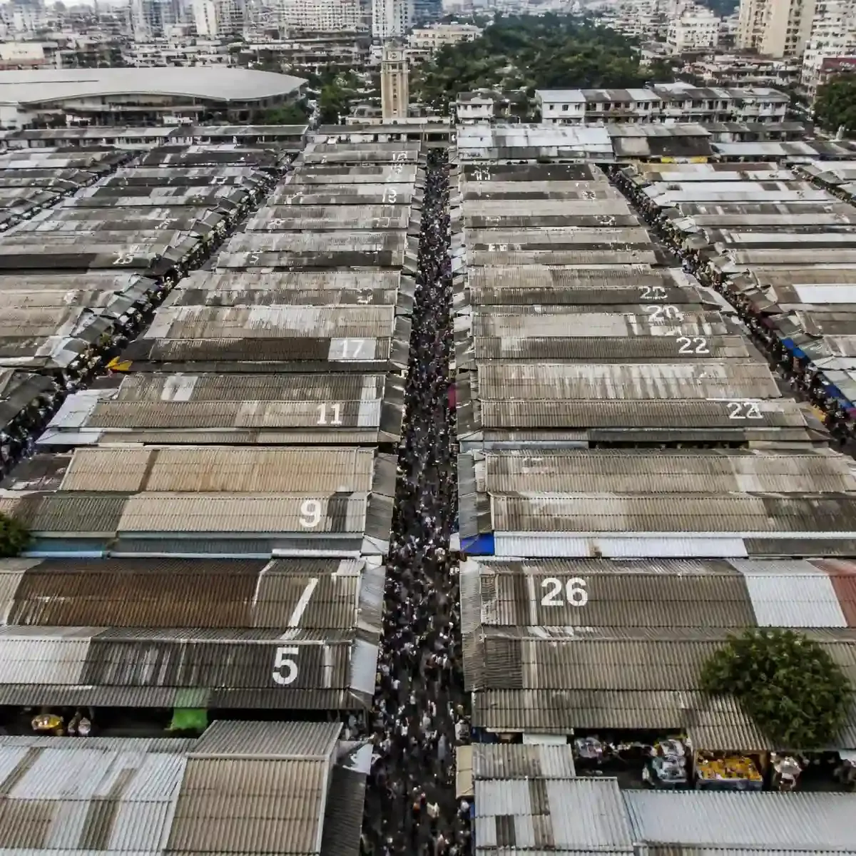 Aerial view of the numbered alleys and corrugated roofing of Chatuchak Weekend Market in Bangkok