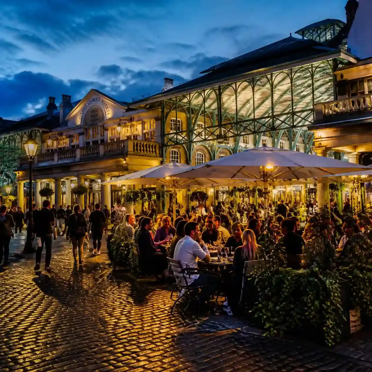 Covent Garden piazza in the evening, the neighbourhood surrounding The Lion King's home at the Lyceum Theatre London