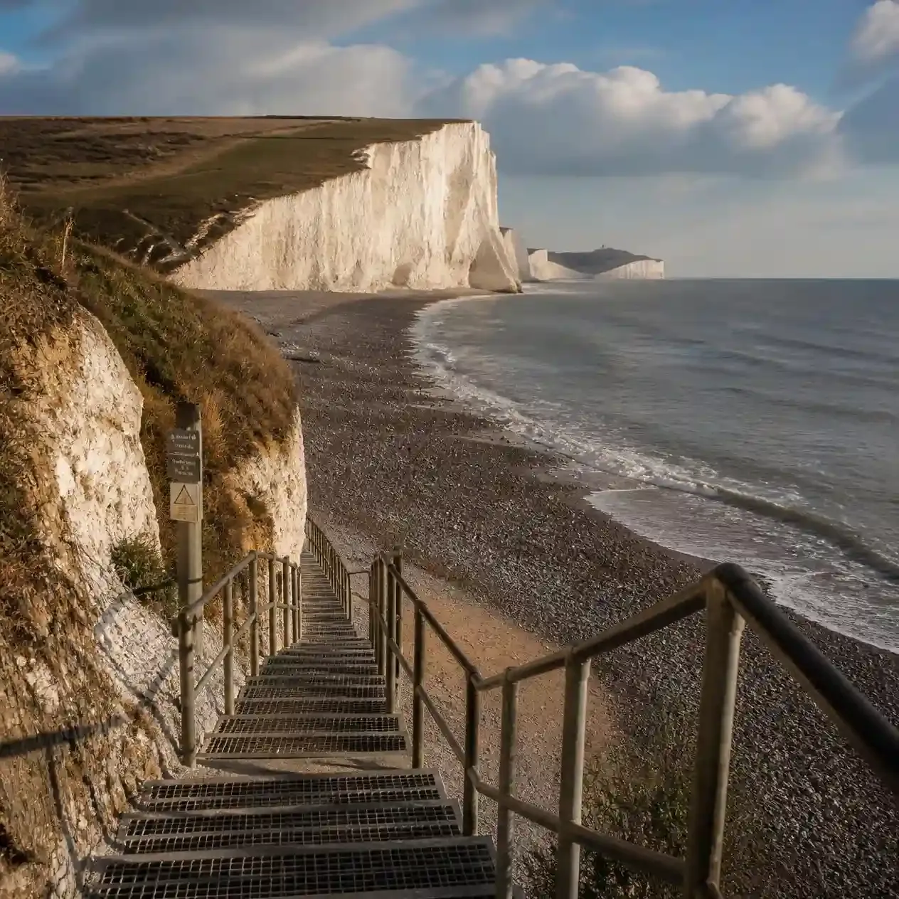 Cliff-face steps down to the beach at Birling Gap below the Seven Sisters chalk cliffs, East Sussex