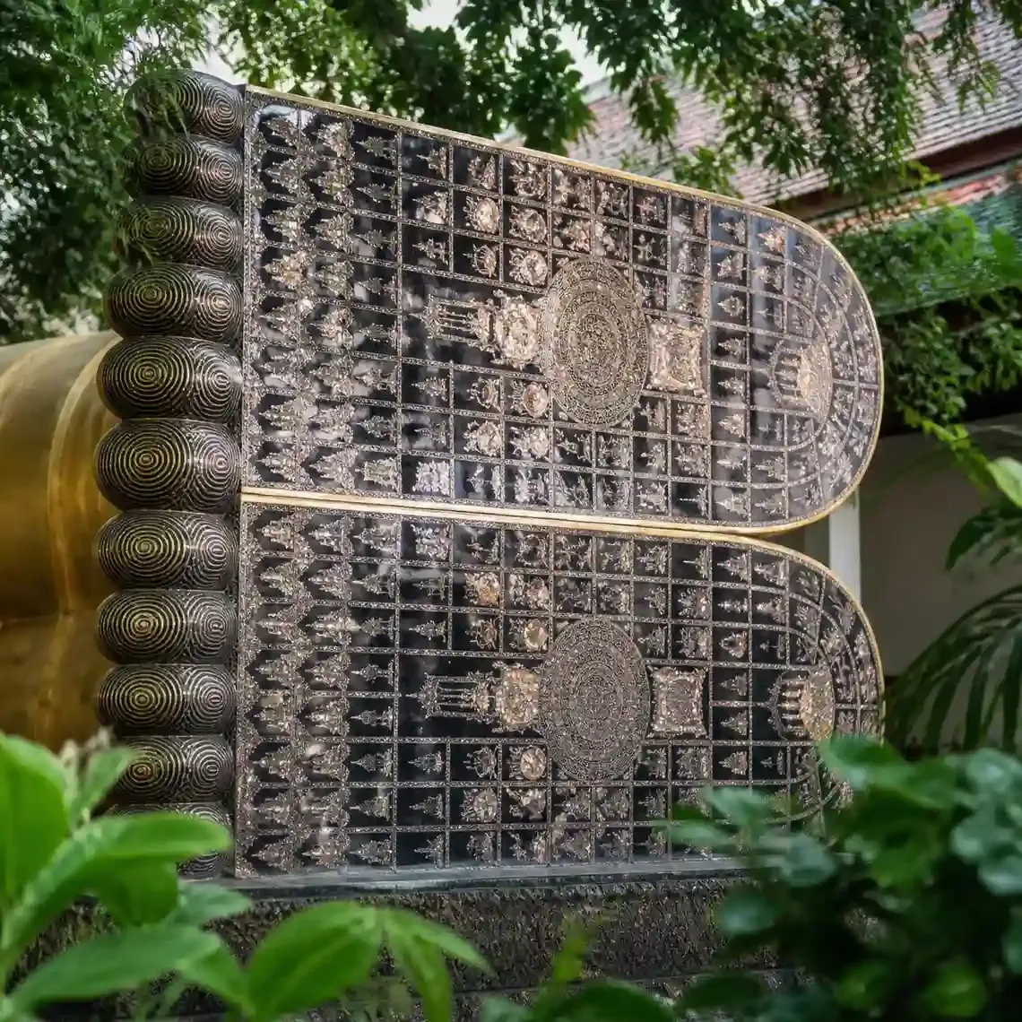 Mother-of-pearl inlay on the soles of the 46-metre reclining Buddha at Wat Pho, a key stop on any Bangkok temples tour