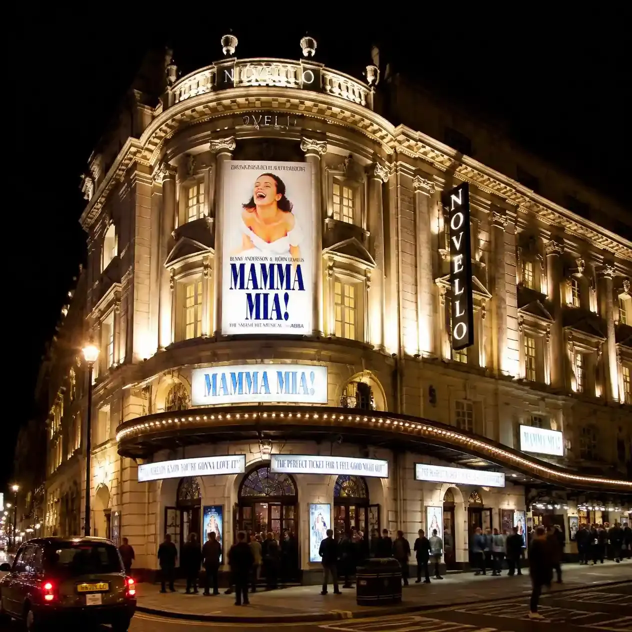 The Novello Theatre on Aldwych in London's West End lit up at night with MAMMA MIA! signage above the entrance