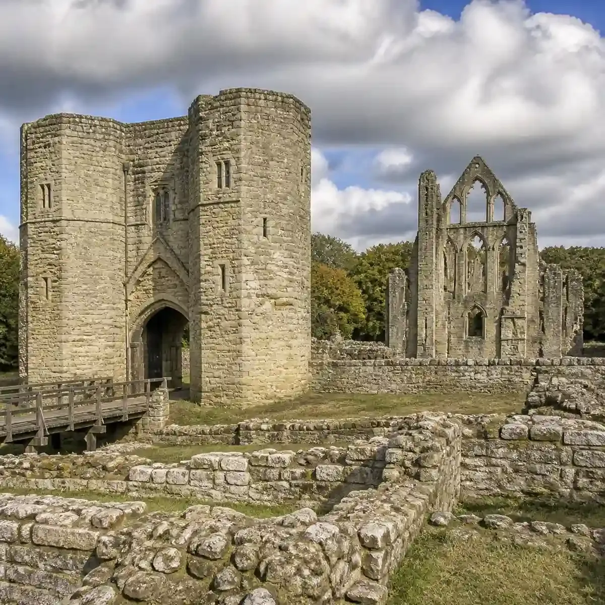 The stone gatehouse and ruins of Battle Abbey on the 1066 battlefield in Battle, East Sussex