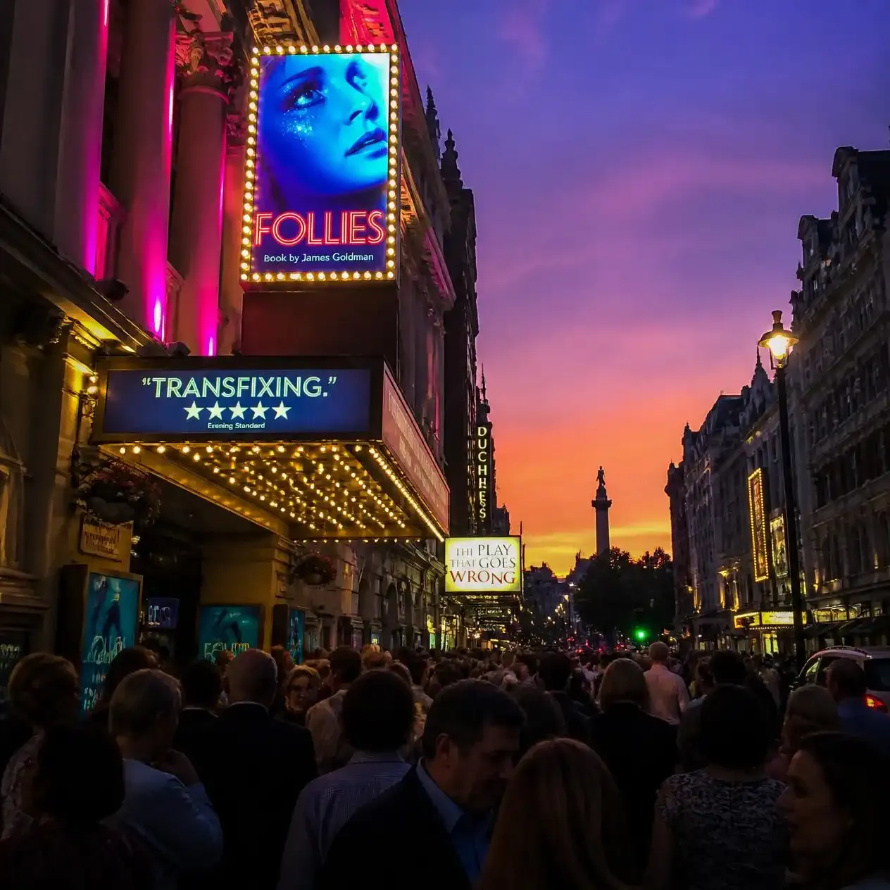 West End theatre marquee lights at dusk near Haymarket, a short walk from Phantom of the Opera in London
