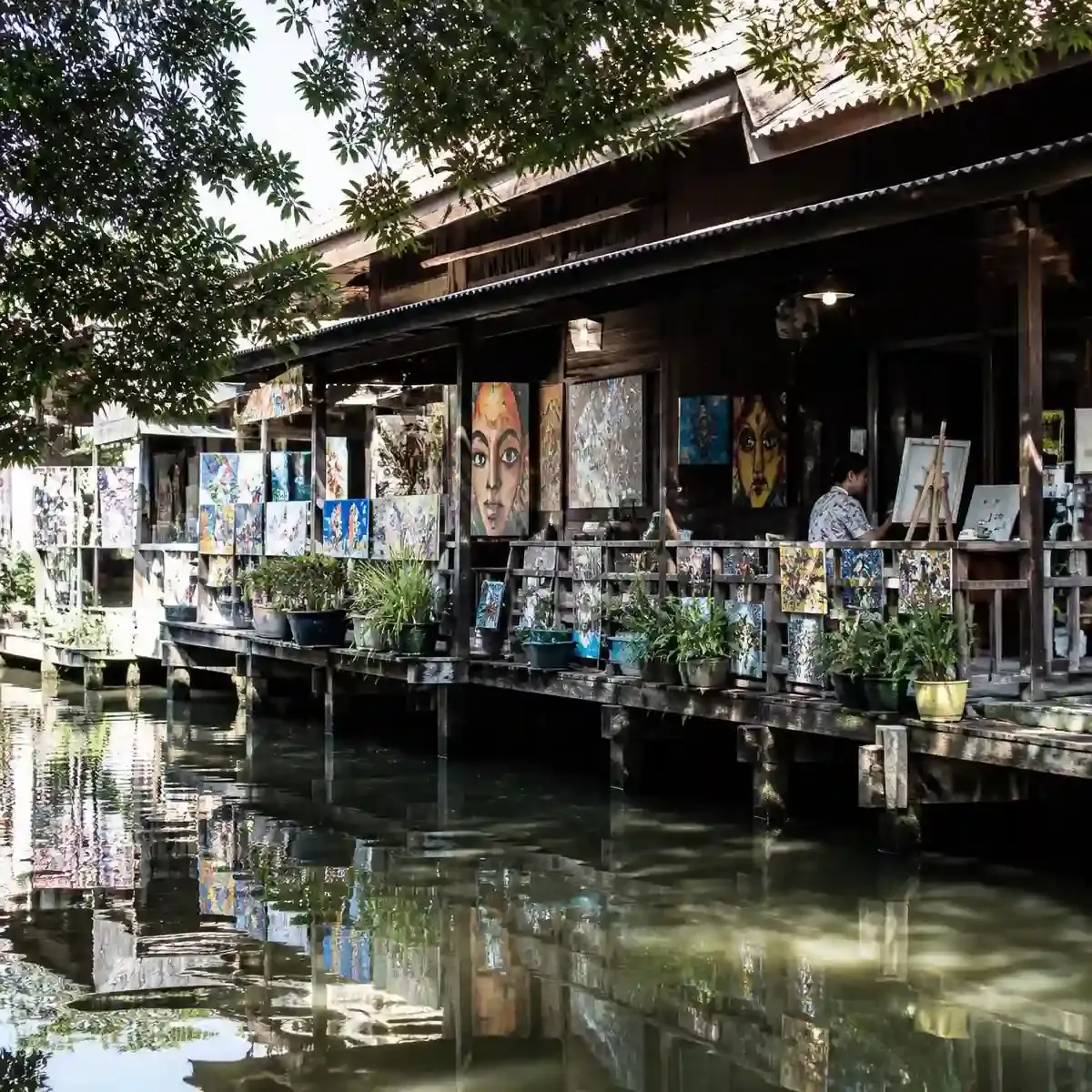 Canal-side wooden buildings at Khlong Bang Luang Artist House on the Thonburi side of Bangkok