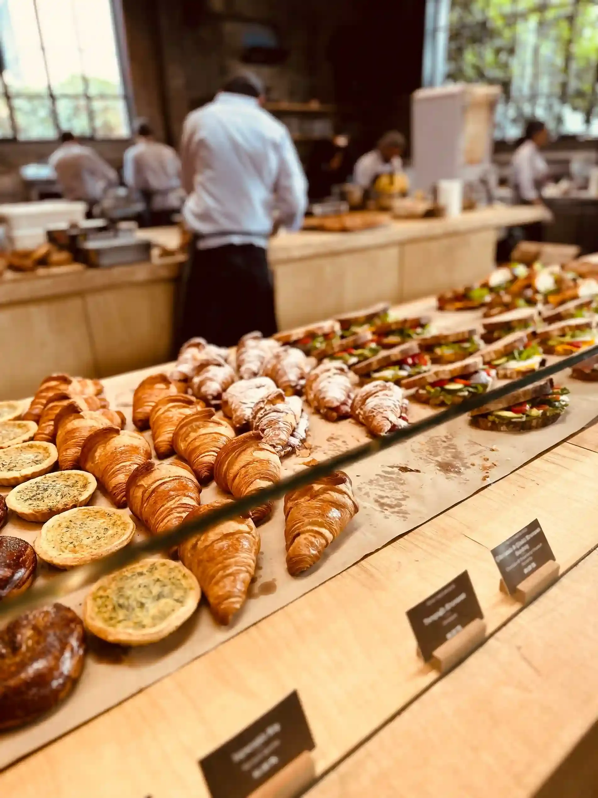 Bakery counter with cardamom buns and pastries on a Notting Hill food tour in London