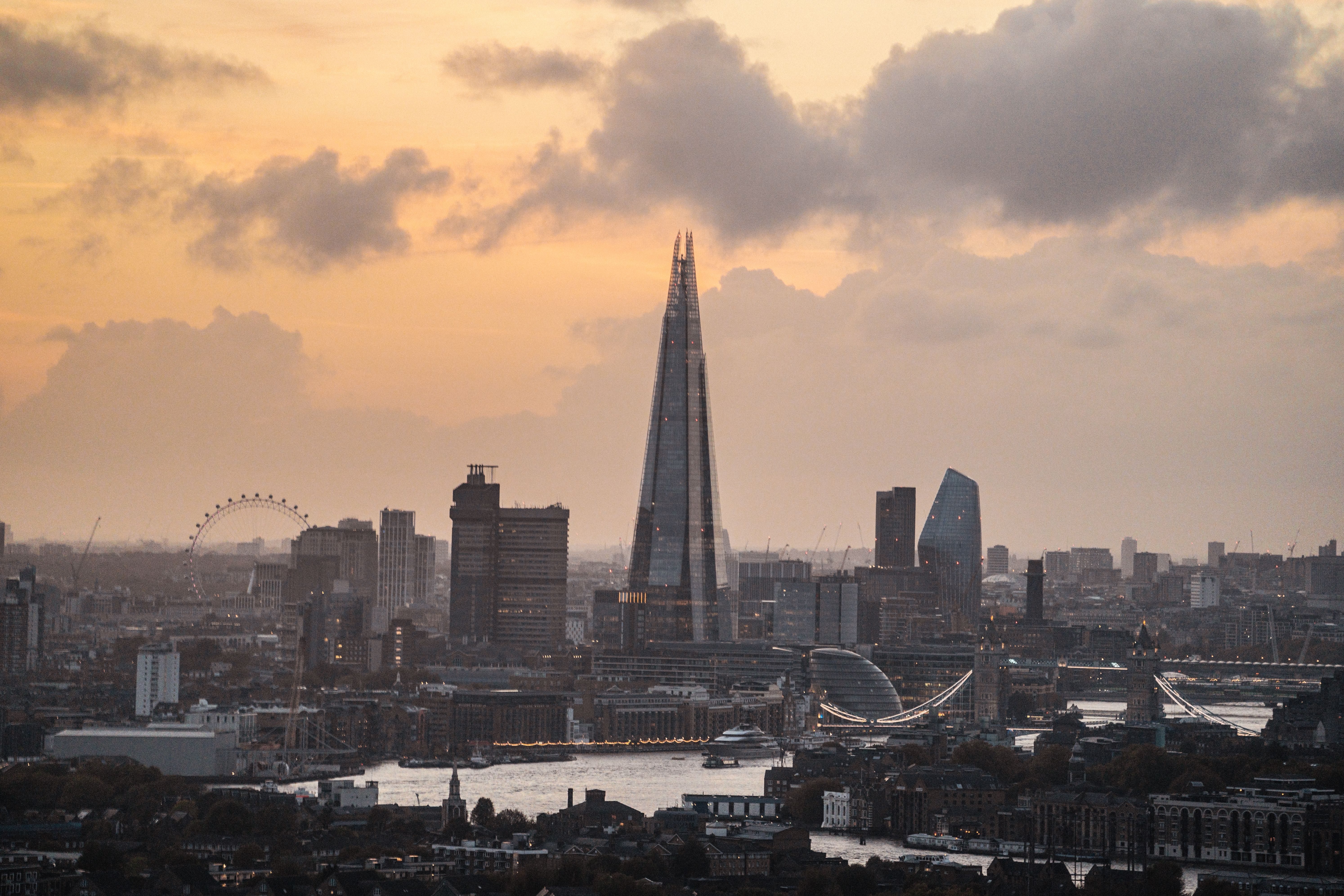 The London Eye and the Shard together in the London skyline at sunset across the River Thames