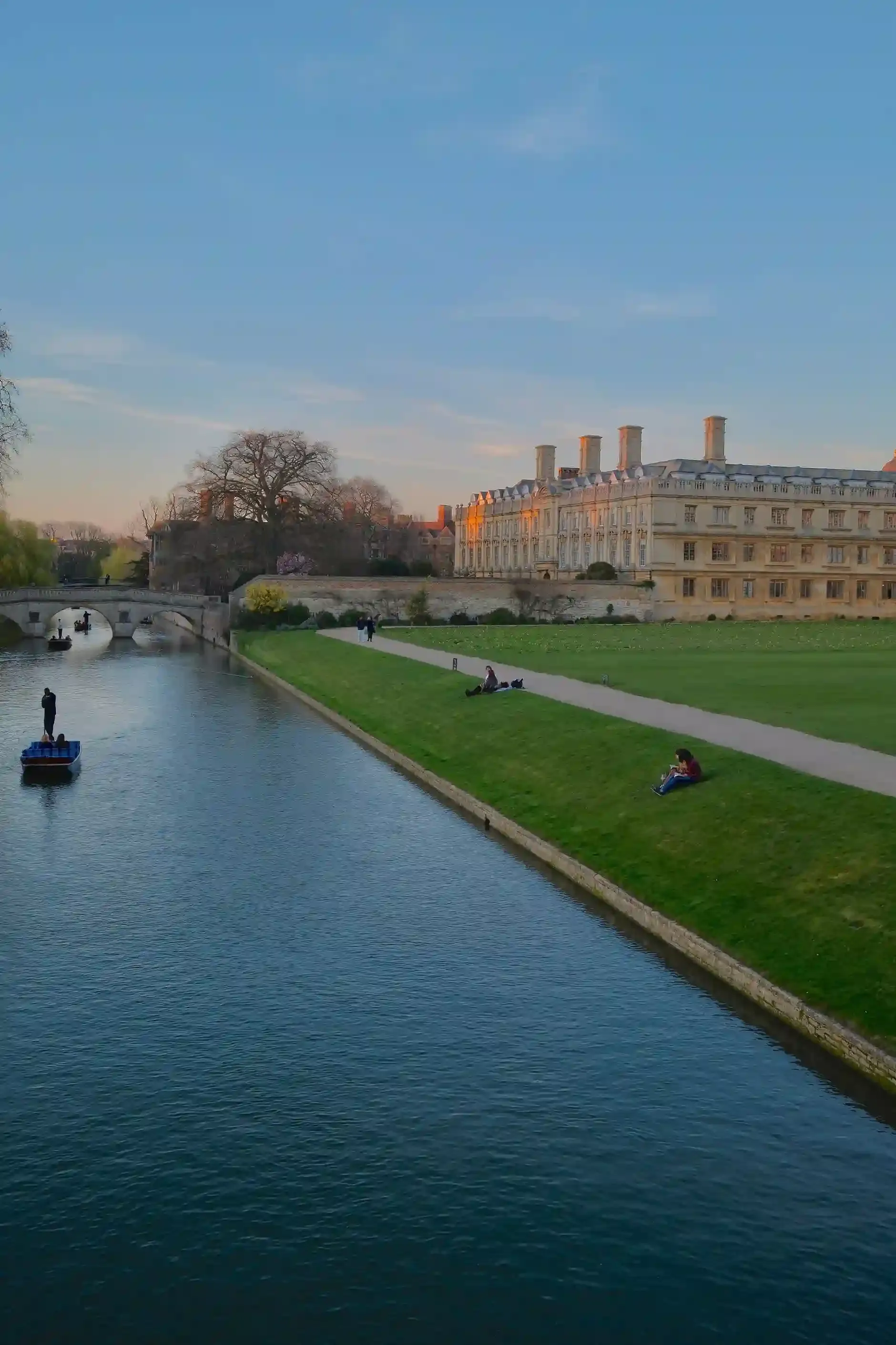 Punting along the River Cam past the Cambridge college backs on a solo day trip from London