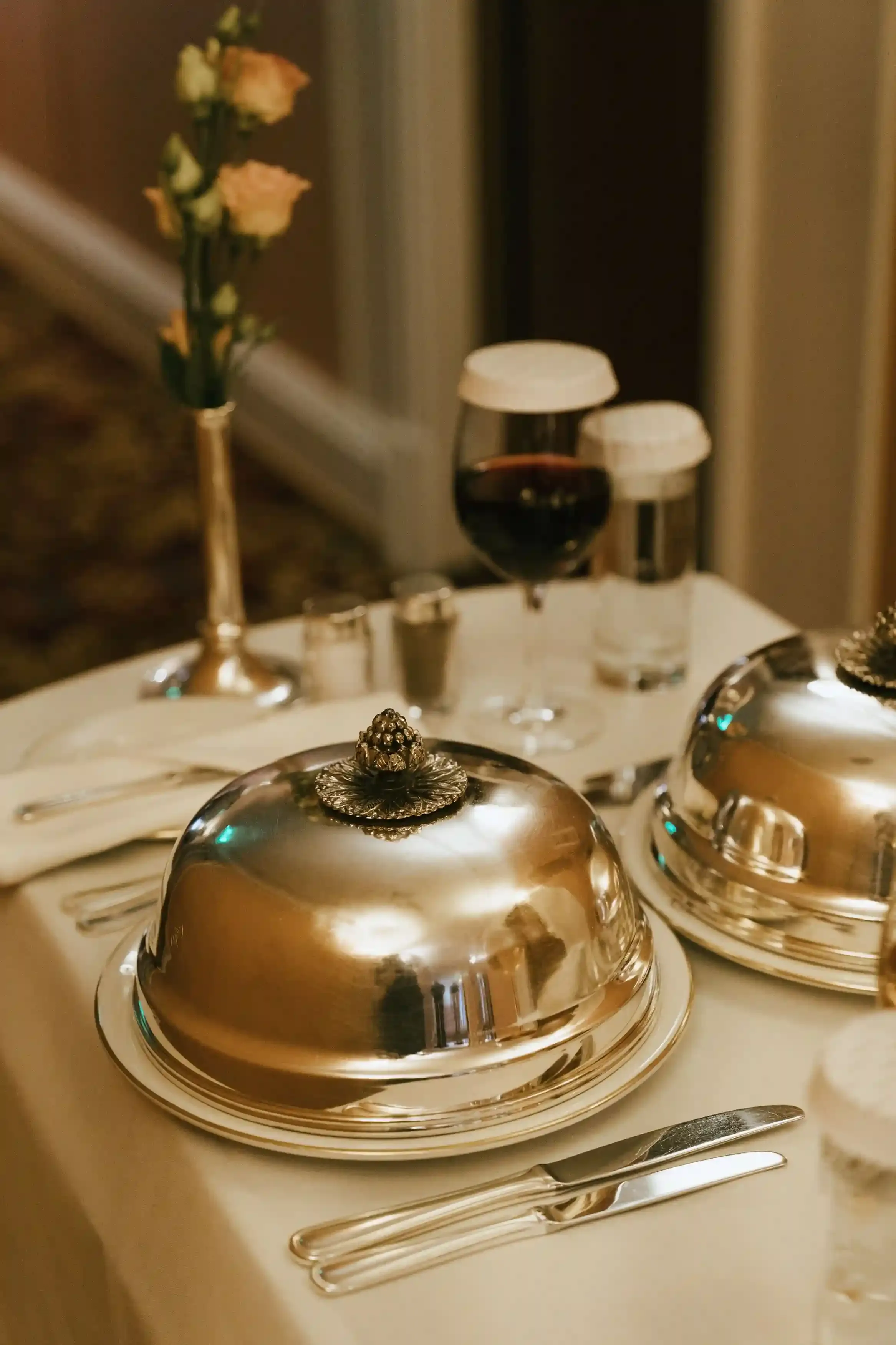 Roast beef carved tableside from a domed silver trolley in a grand historic London dining room