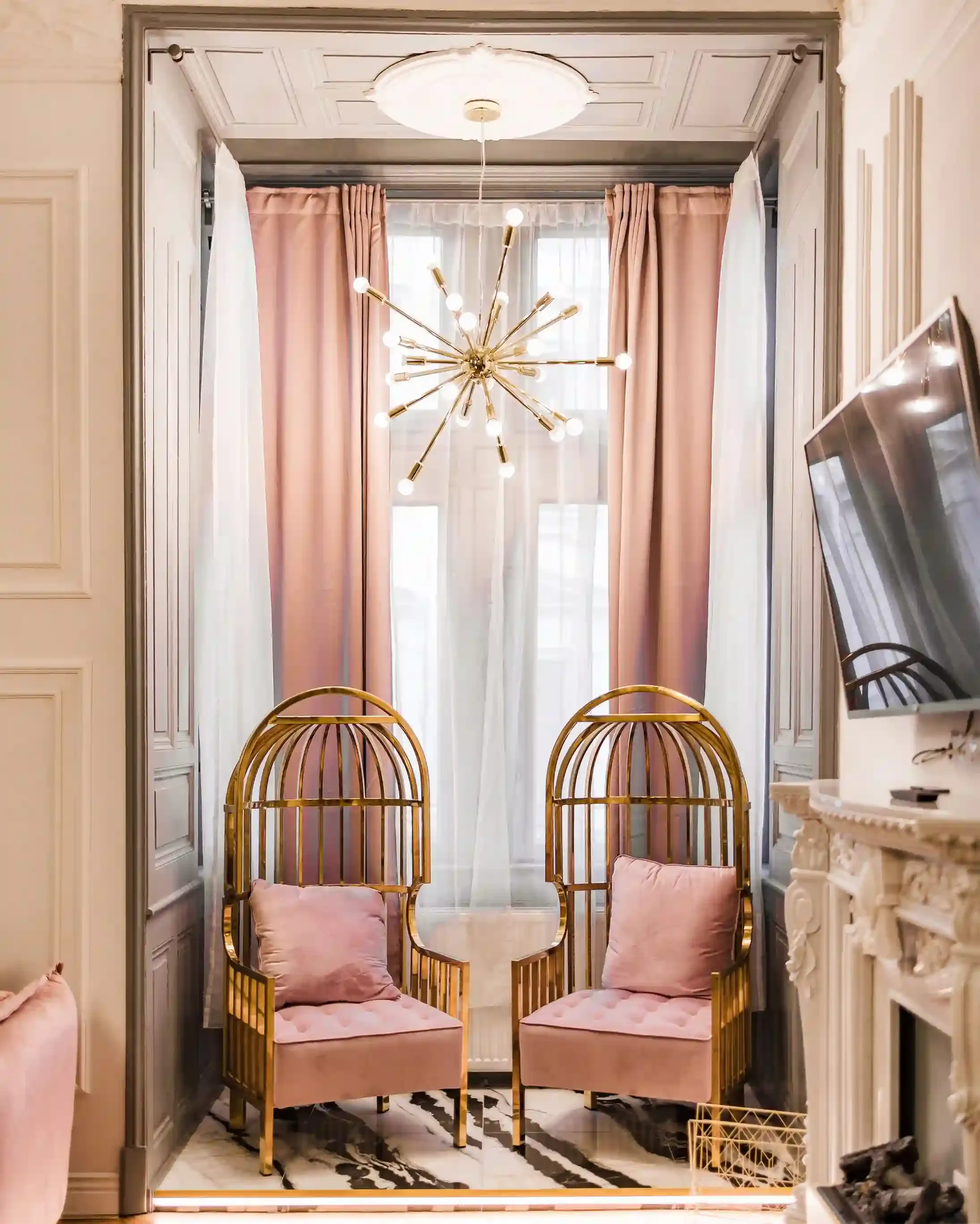 Sketch's pink velvet Gallery in Mayfair set for afternoon tea beneath rotating contemporary art