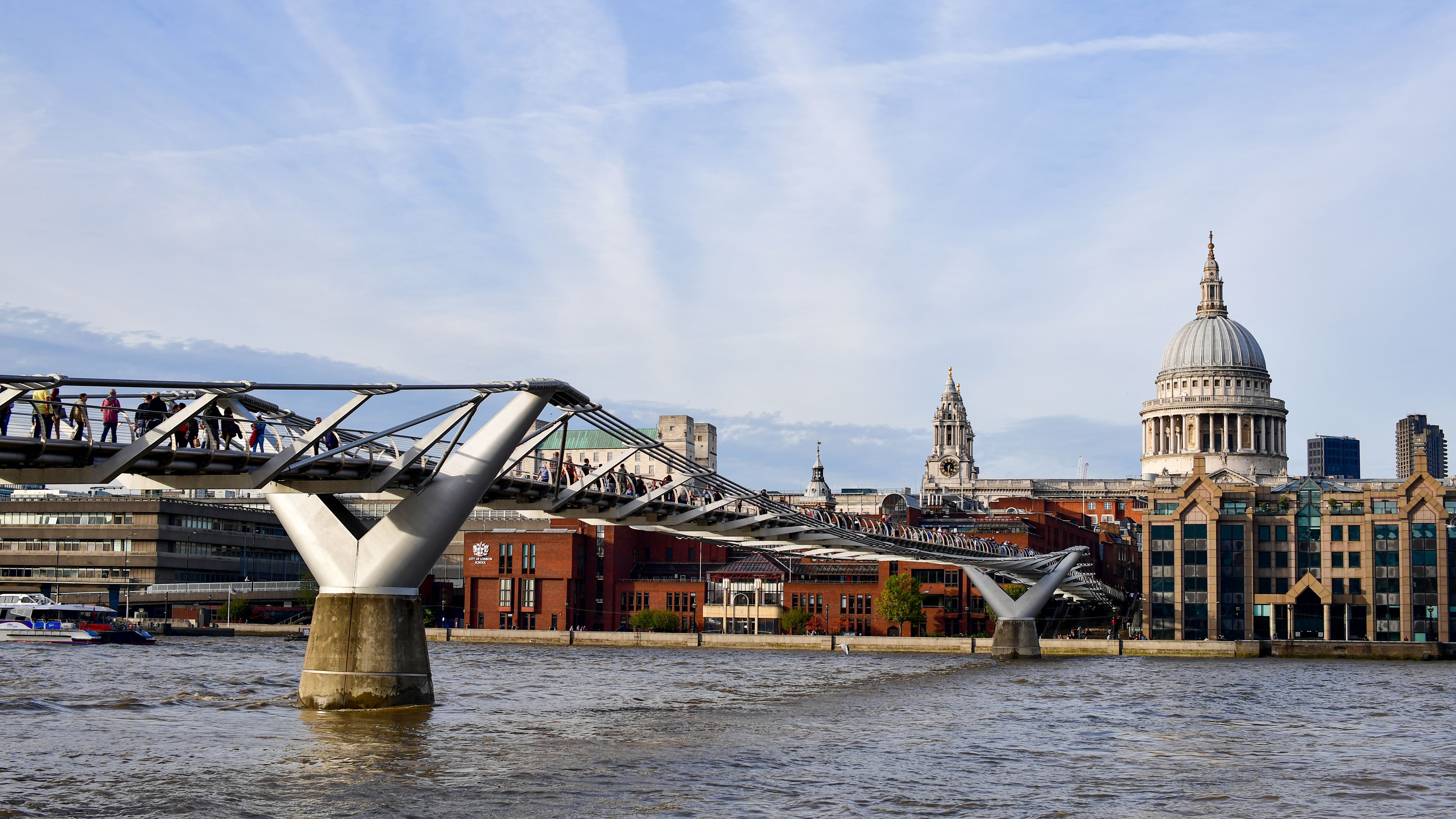 View across the Millennium Bridge towards St Paul's Cathedral dome, one of the central cultural sites in London